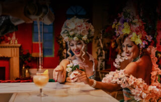 Burlesque Performers ordering cocktail at the bar